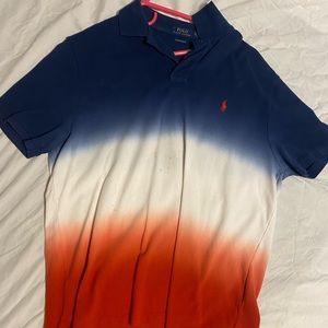Red white and blue polo Ralph Lauren has a stain on it